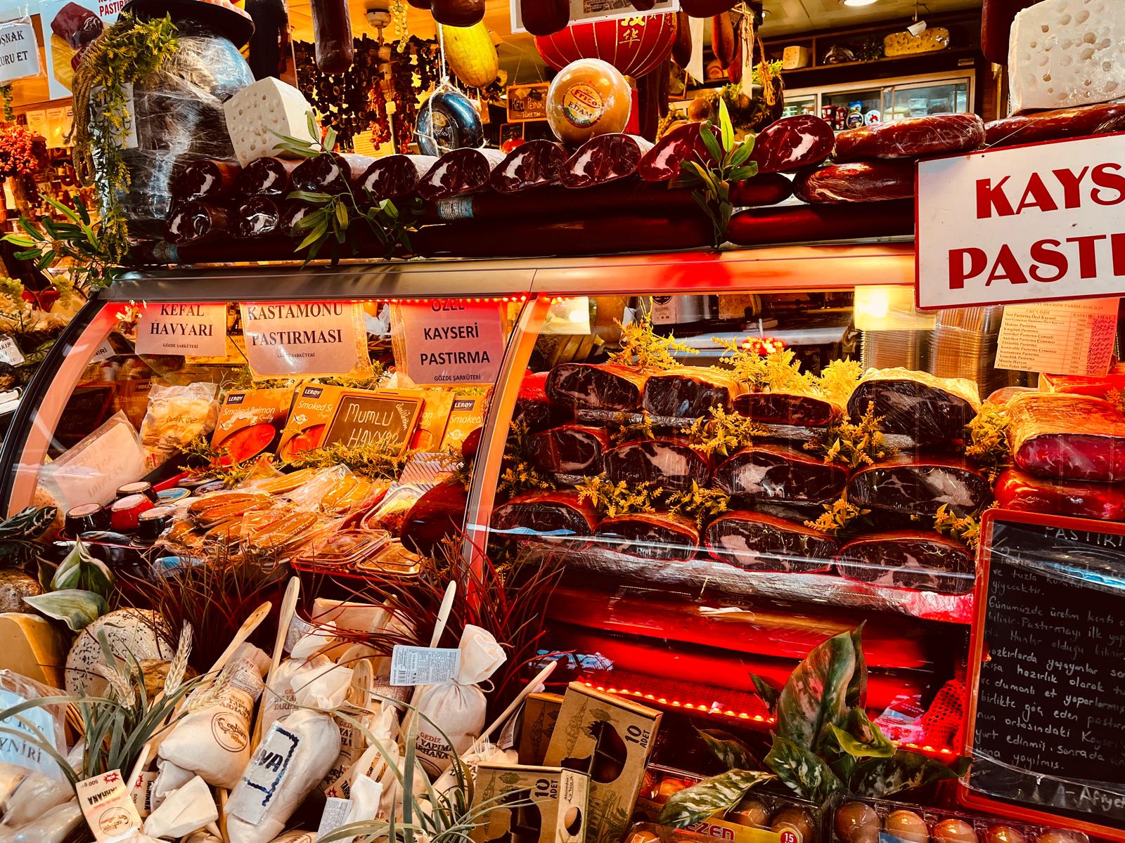 Traditional deli counter with cured meats and cheeses in Kadıköy