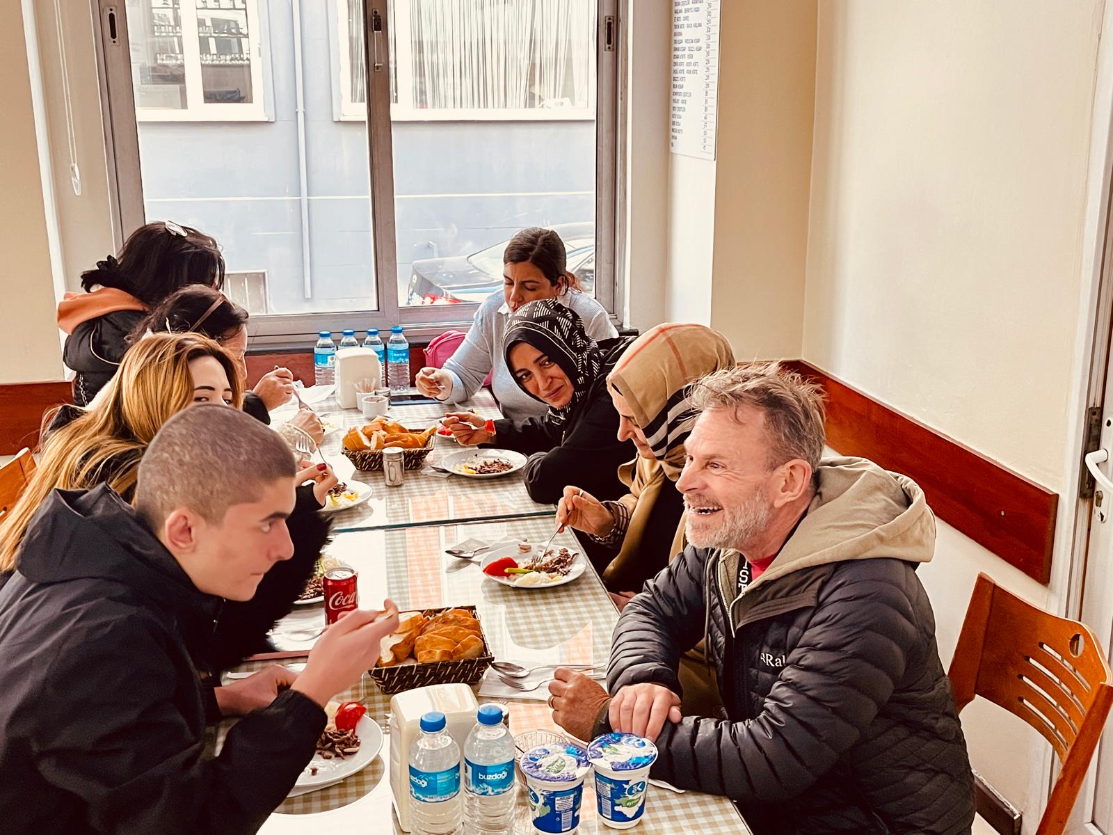 Visitors sharing a traditional Turkish lunch in Kadıköy